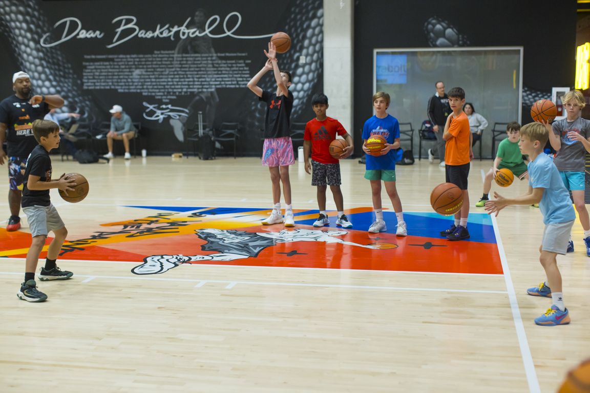 Skills Class group working on form shooting and passing reps.